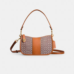 Disney X Coach Swinger Bag In Regenerative Leather With Mickey Mouse And Friends