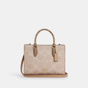 Maggie Small Tote Bag In Blocked Signature Canvas