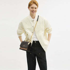 Klare Crossbody Bag In Blocked Signature Canvas