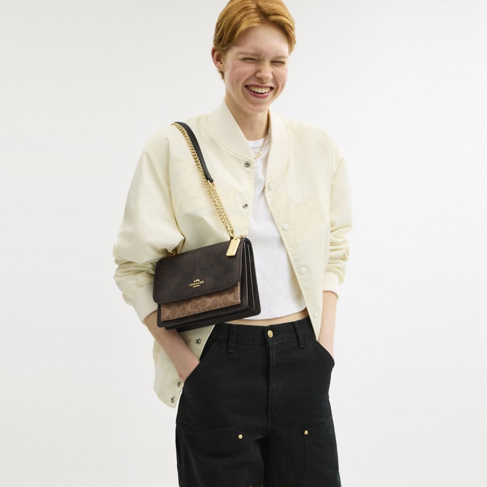 Klare Crossbody Bag In Blocked Signature Canvas