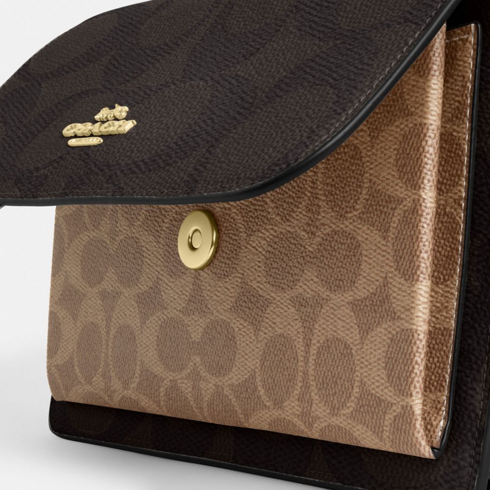 Klare Crossbody Bag In Blocked Signature Canvas