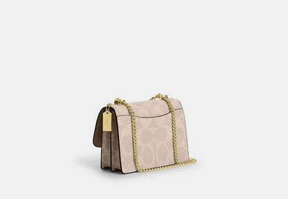 Klare Crossbody Bag In Blocked Signature Canvas