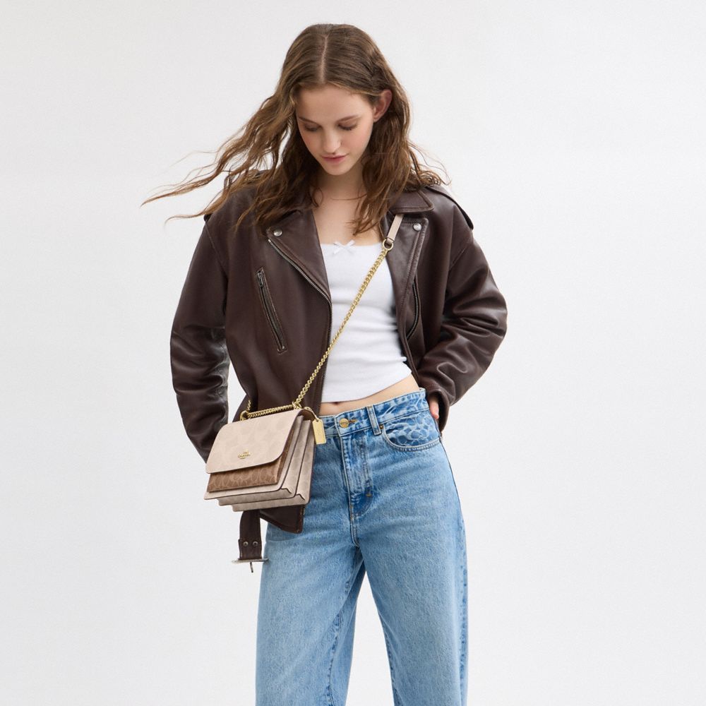 Klare Crossbody Bag In Blocked Signature Canvas