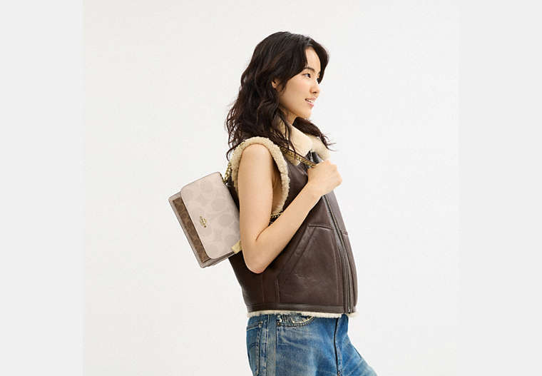 Klare Crossbody Bag In Blocked Signature Canvas