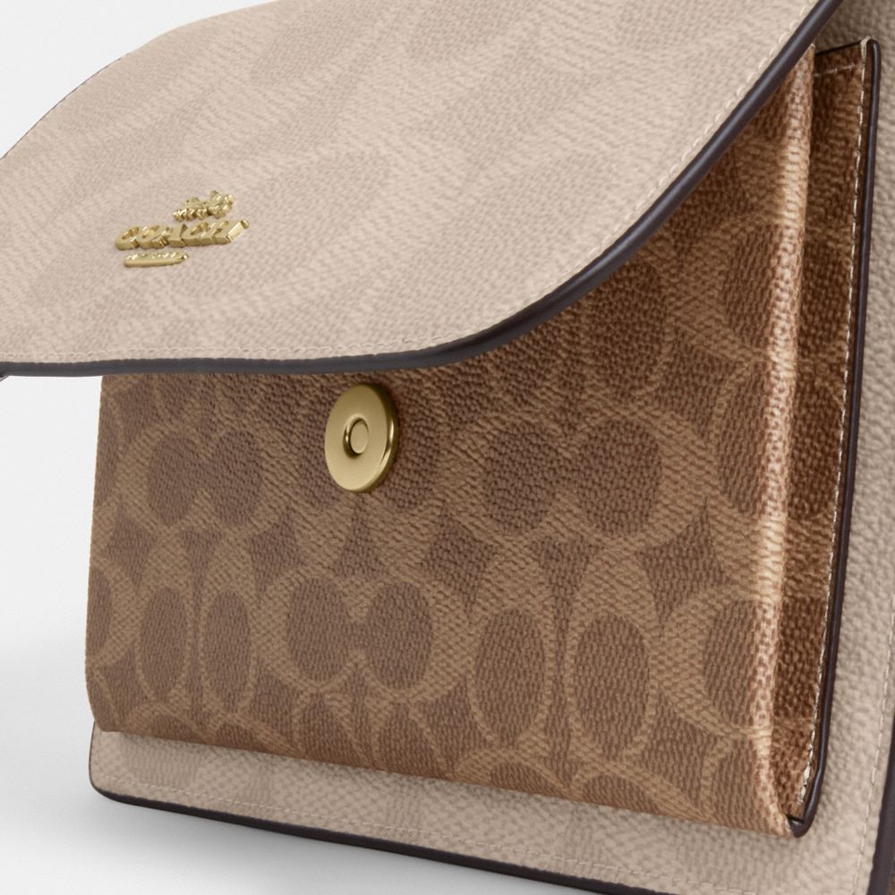 Klare Crossbody Bag In Blocked Signature Canvas