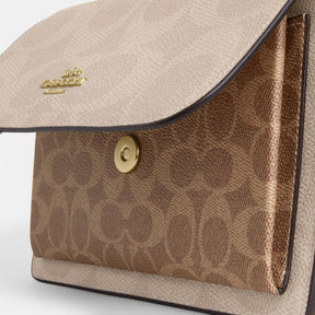 Klare Crossbody Bag In Blocked Signature Canvas