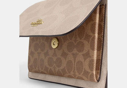 Klare Crossbody Bag In Blocked Signature Canvas