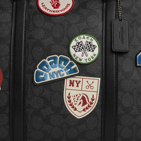 Venturer Bag In Signature Canvas With Patches