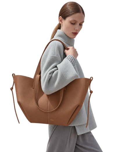 [AI-GENERATED:MODEL_PRIMARY] Cyme Edition Textured Camel — Human Model