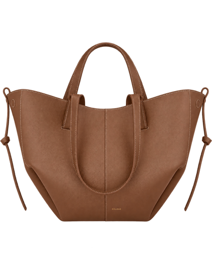 [AI-GENERATED:THREE_QUARTER_FRONT] Cyme Edition Textured Camel — Three-Quarter Front