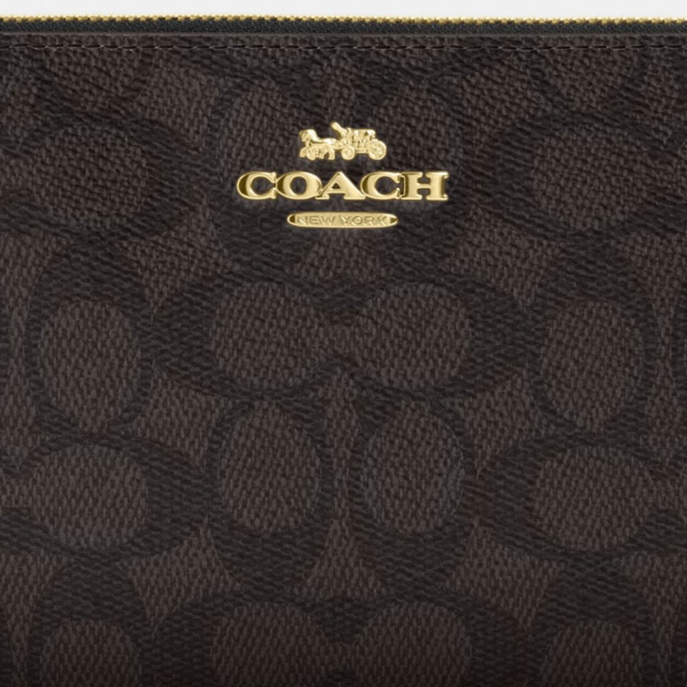 Large Corner Zip Wristlet In Signature Canvas
