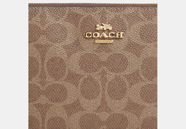 Large Corner Zip Wristlet In Signature Canvas