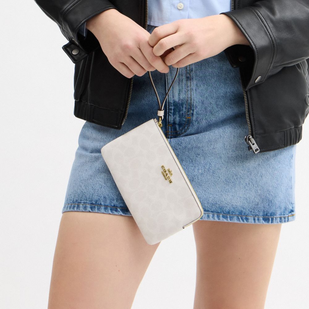 Large Corner Zip Wristlet In Signature Canvas