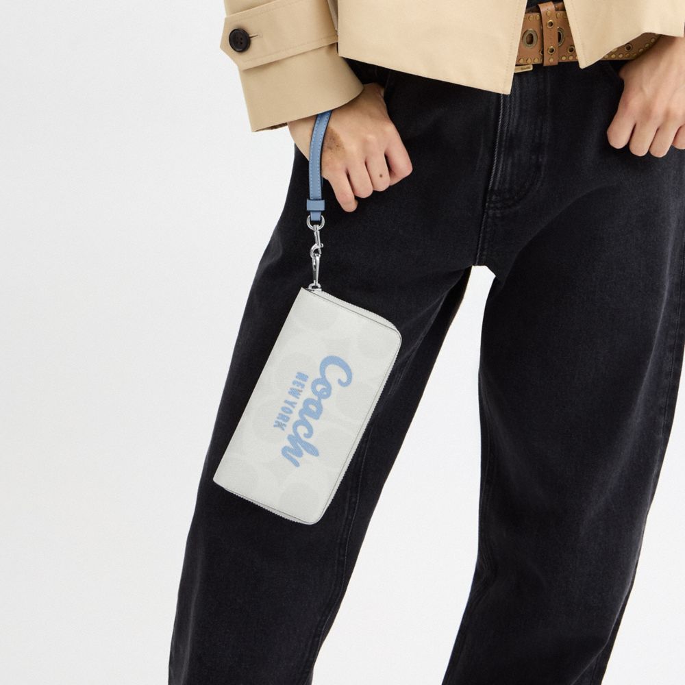 Long Zip Around Wallet In Signature Canvas With Coach Graphic