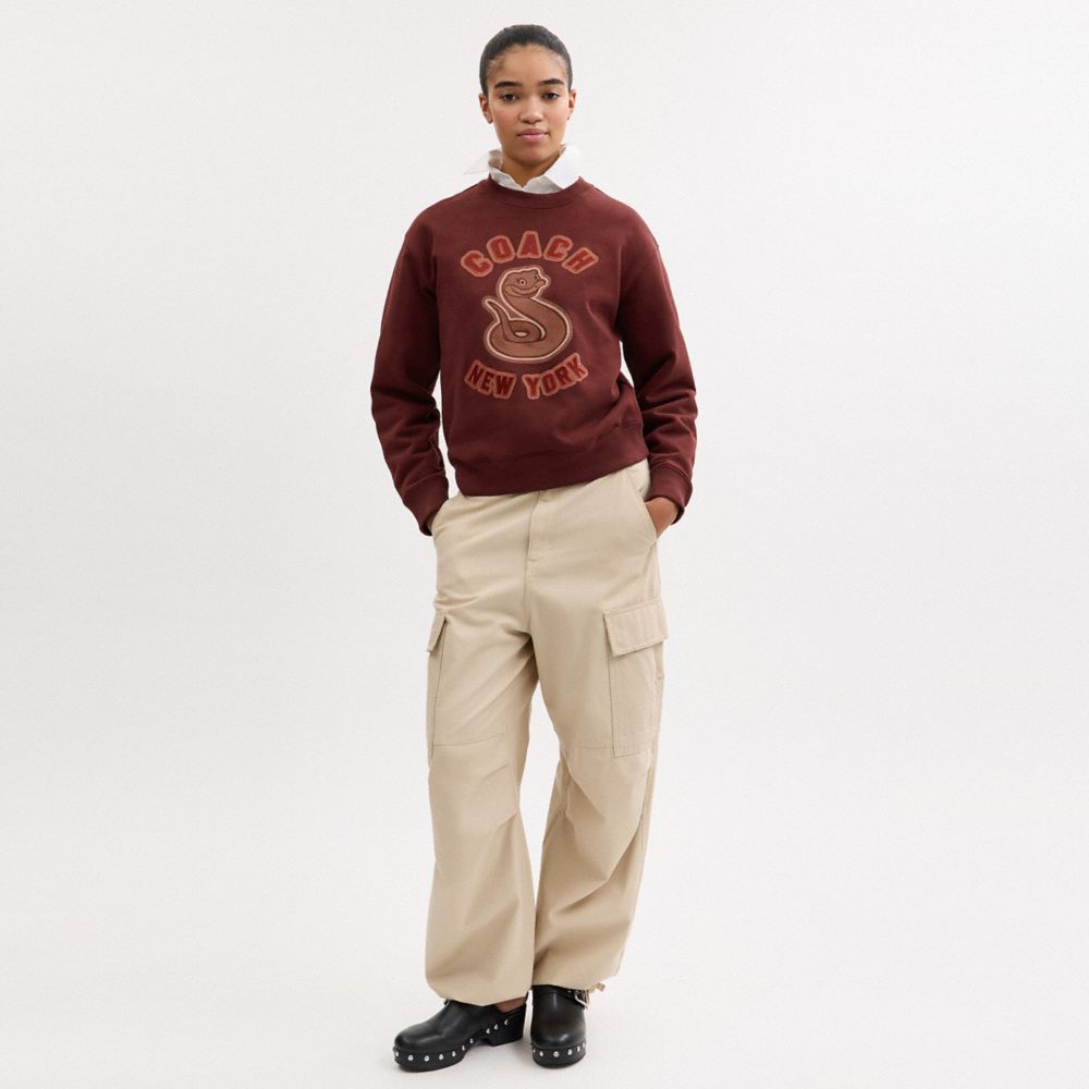 New Year Crewneck Sweatshirt With Snake Graphic