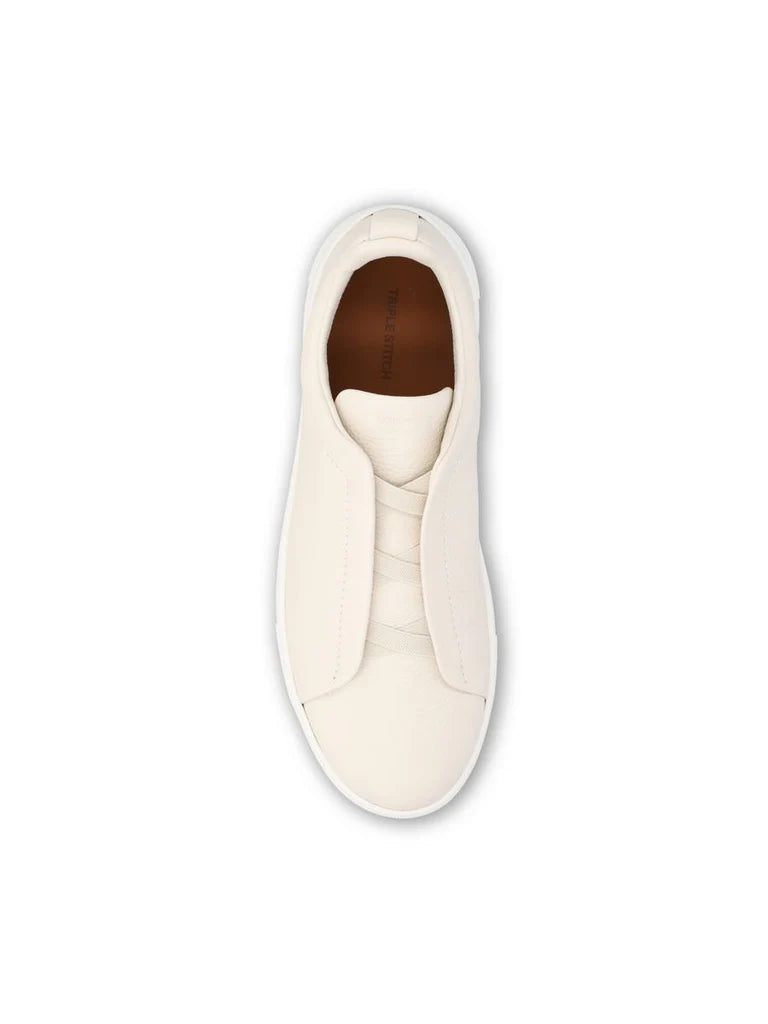 Zegna Men’s Triple Stitch™ White Deerskin Slip-On Sneakers – Made in Italy | Iconic Luxury Footwear