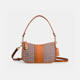 Disney X Coach Swinger Bag In Regenerative Leather With Mickey Mouse And Friends