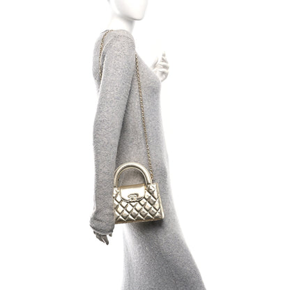 Metallic Shiny Aged Calfskin Quilted Nano Kelly Shopper Gold