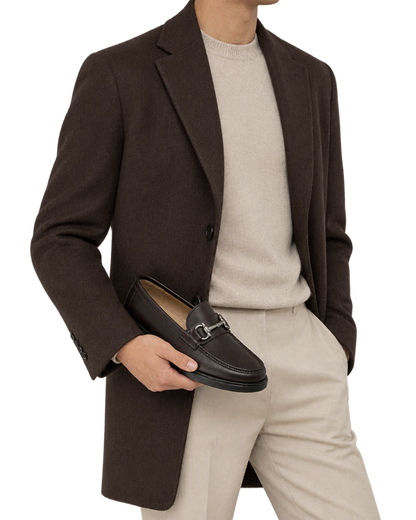 Ferragamo Gancini dark brown leather loafer featuring a signature