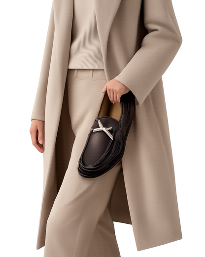 Ferragamo Gancini dark brown leather loafer featuring a signature