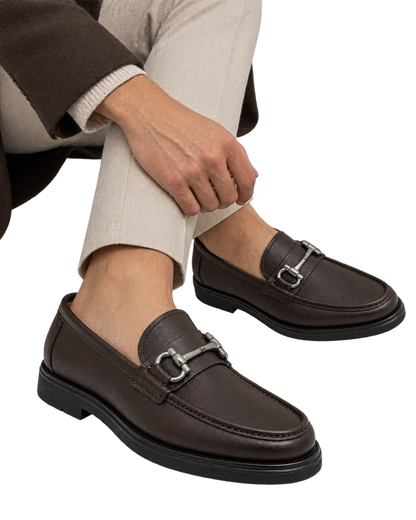 Ferragamo Gancini dark brown leather loafer featuring a signature