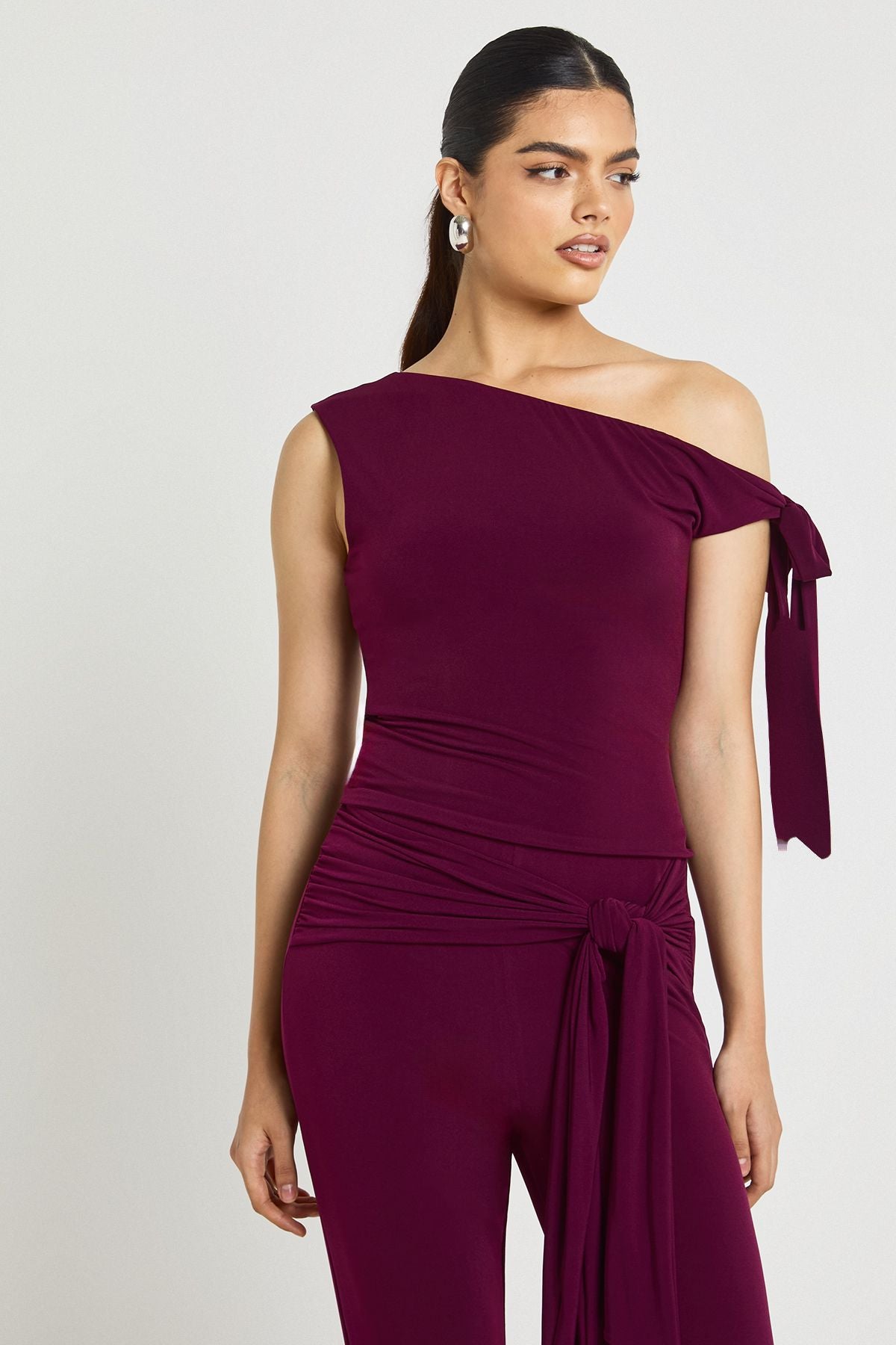 Double Layer Slinky Asym Shoulder Knot Detail Top