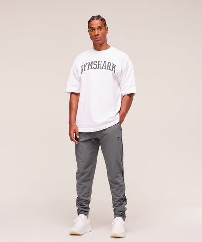 Gymshark Arrival Woven Block Joggers - Dark Grey