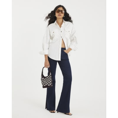 Indigo High Rise Split Hem Flared Jeans