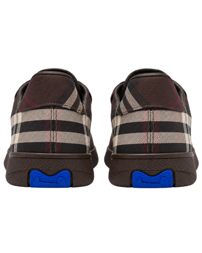 Lace-up sneakers with a checkered pattern