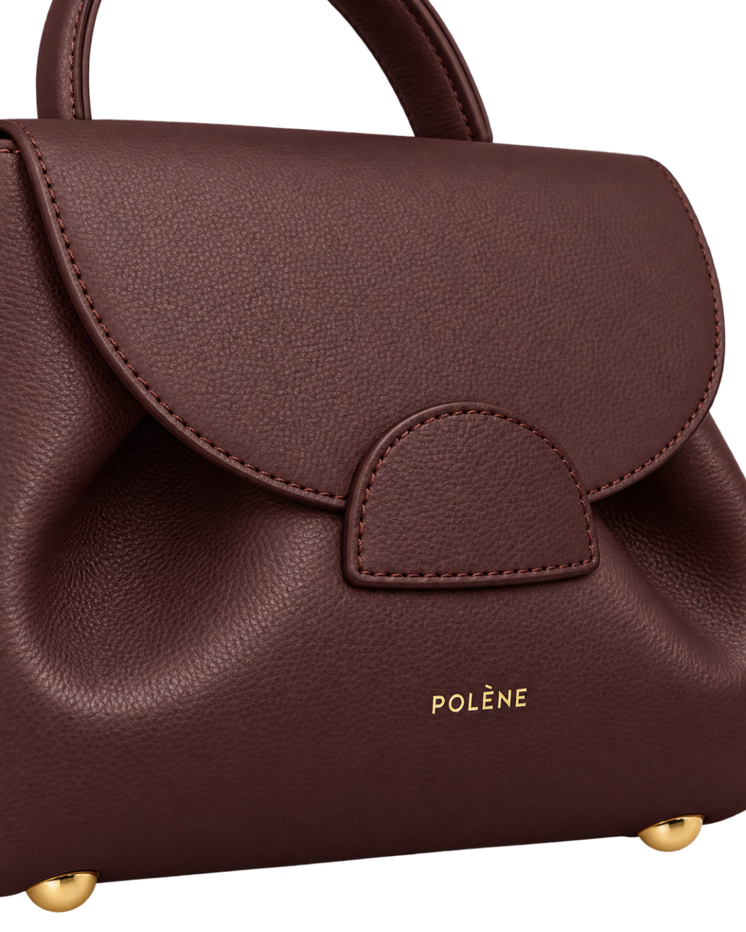 [AI-GENERATED:MACRO_DETAIL] Numéro Un Nano Edition Textured Burgundy — Macro Detail