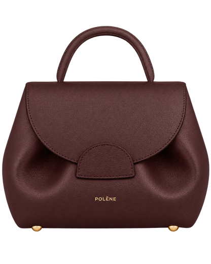 [AI-GENERATED:THREE_QUARTER_FRONT] Numéro Un Nano Edition Textured Burgundy — Three-Quarter Front