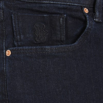 Petite Indigo High Rise Flared Jeans