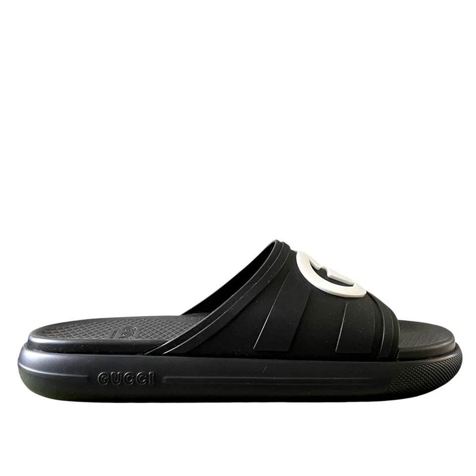 Gucci Pursuit Interlocking G slides in black rubber with bold Interlocking G motif and durable rubber sole.