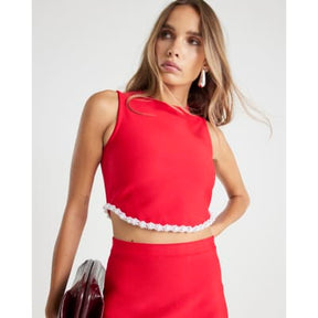 Red sleeveless embellished crop top
