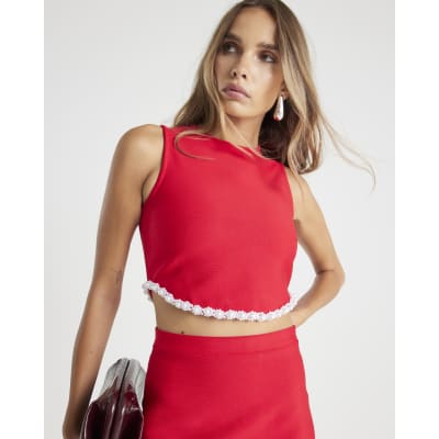Red sleeveless embellished crop top