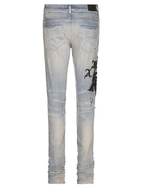Amiri Wes Lang Reaper Logo Clay Indigo Jeans in Blue