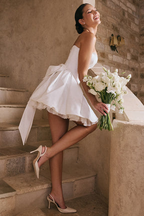 Noele white satin strapless bow mini gown