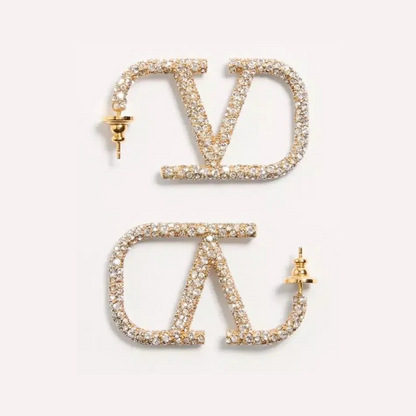 Signature Earrings In Metal And Swarovski Crystals.