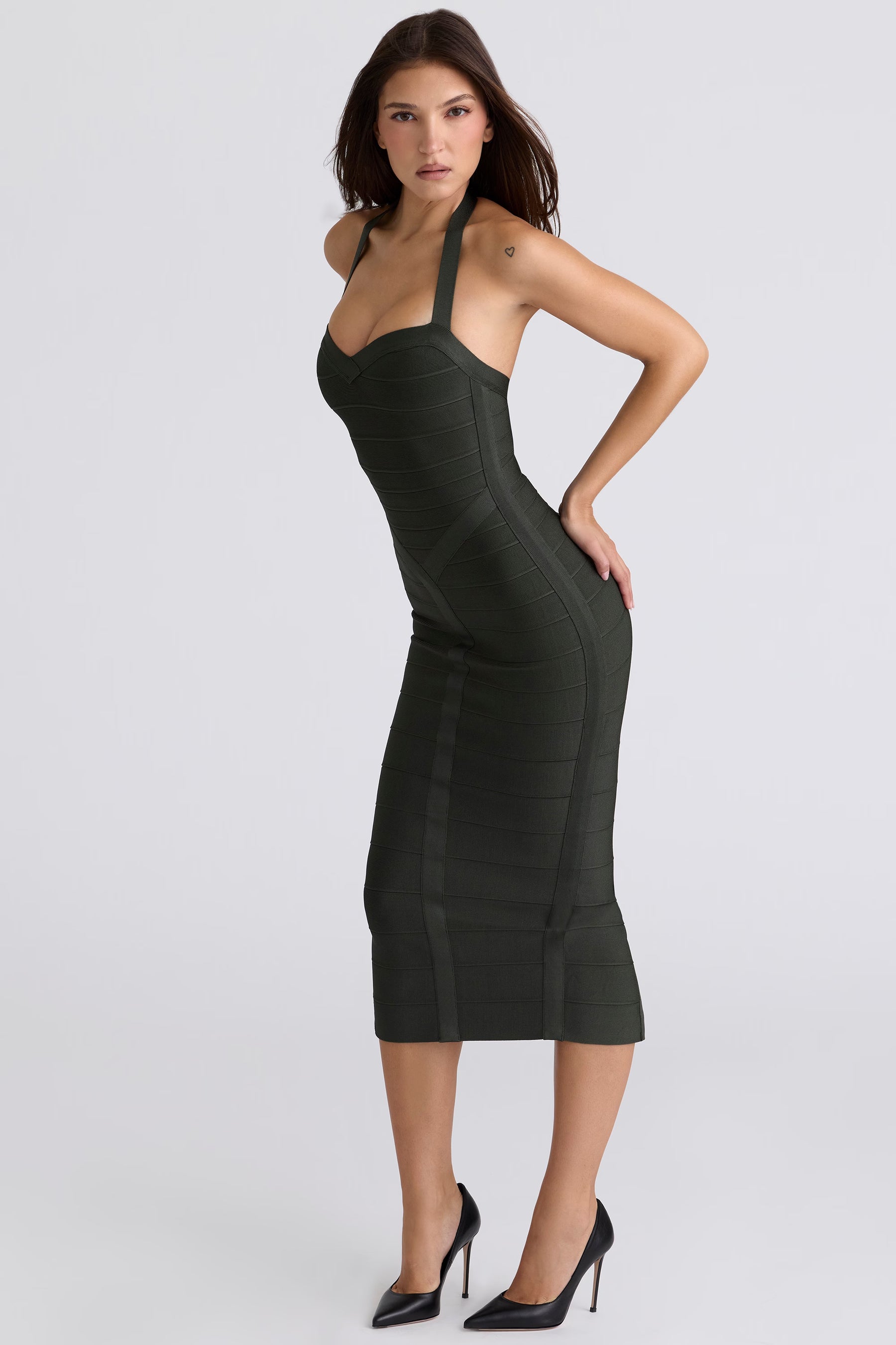 The Supermodel emerald halter neck bandage midi dress
