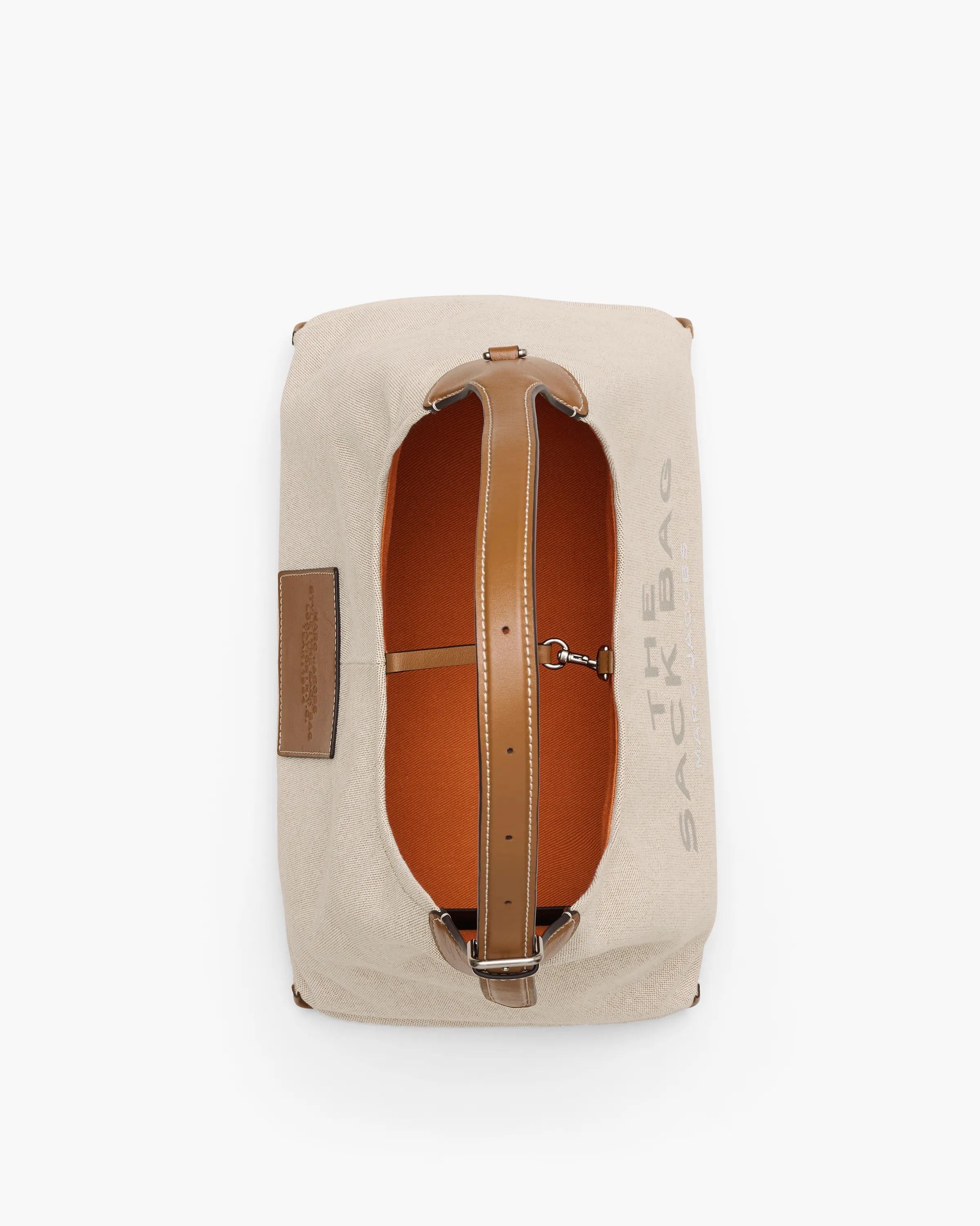 The Leather-Trim Canvas Belted Sack Bag