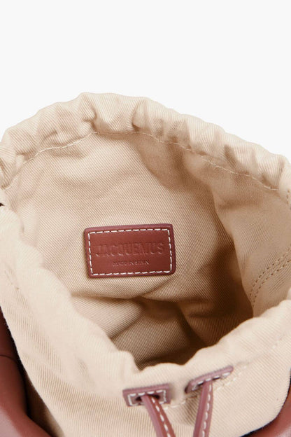 Jacquemus JACQUEMUS Le Panier leather-trimed raffia bucket bag - Bags | Shop From The Mirage