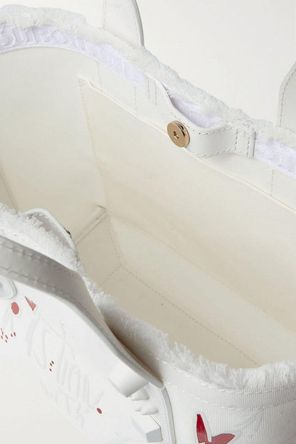 Christian Louboutin CHRISTIAN LOUBOUTIN Frangibus small leather-trimmed frayed printed canvas tote - Bags | Shop From The Mirage