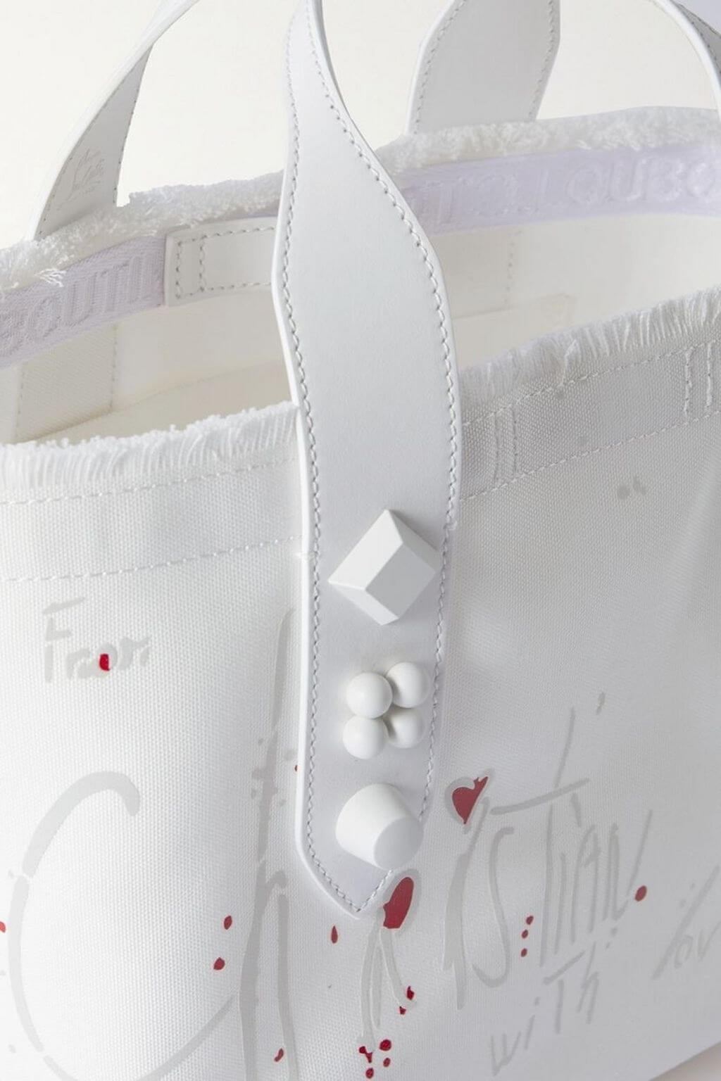 Christian Louboutin CHRISTIAN LOUBOUTIN Frangibus small leather-trimmed frayed printed canvas tote - Bags | Shop From The Mirage