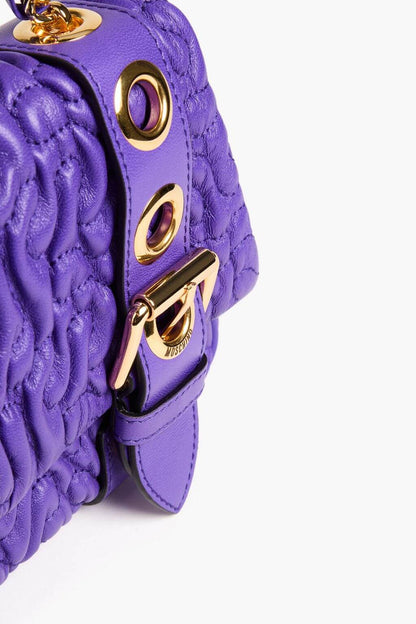 Moschino MOSCHINO Destroyed Chain buckle-embellished quilted leather cross-body bag - Bags | Shop From The Mirage