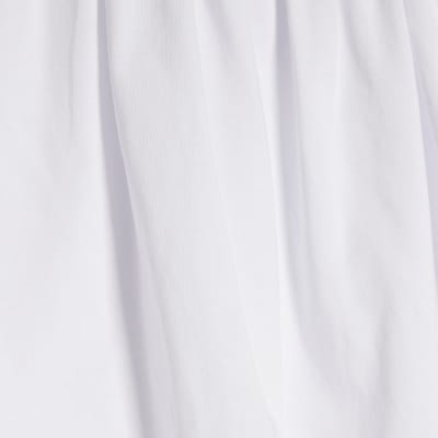 White Sleeveless Bubble Hem Top